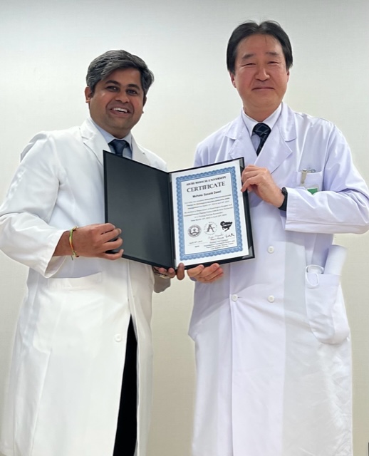 Dr. Mohana Sasank Deevi receiving certification from Prof. Shigeru Miyachi in Japan